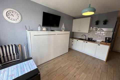 The cozy holiday studio is located on the first floor of an apartment building. The facility is located in the center of a charming, small seaside resort. The beautiful, sandy beach is only approx. 450 m away. A comfortable holiday studio with a balc...