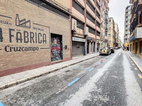 Unique opportunity! A spacious local for sale or rent to buy, in the heart of downtown Soho in Malaga, located in the prestigious Cristóbal parking building, right next to the renowned brewery 