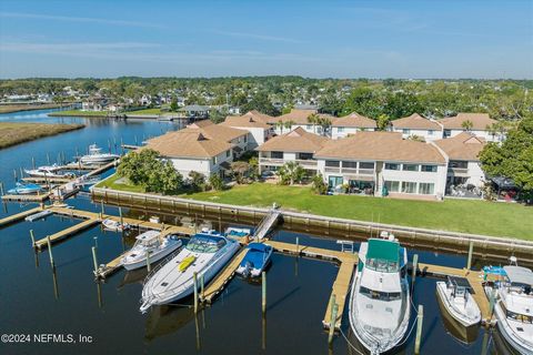 Get your daily dose of Vitamin Sea, in this thoughtfully updated townhouse style condo in the quaint waterfront community of The Moorings! Wake up every morning to witness breathtaking sunrises with a full view of the Intracoastal Waterway! This is n...