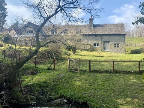 Cwm Gwyddel is a Grade II listed building originally dating back to the 15th century but now provides spacious accommodation over two floors. The property also includes a Grade II Listed stone barn with four bays, plus two additional outbuildings cur...