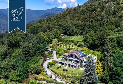 A panoramic ultramodern villa is sold in the vicinity of Verbania on the charming lake Maggiore. A house with an area of ​​more than 1450 sq.m, located at three levels, is surrounded by luxurious gardens and terraces with an area of ​​5200 sq.This op...