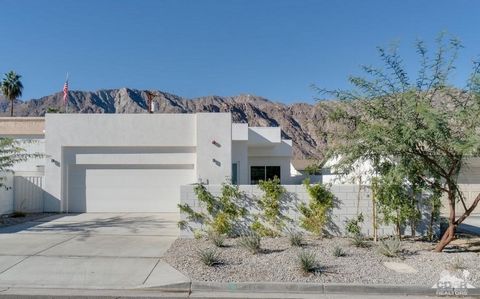 Priced below market seller is motivated as she is moving out of state: Contemporary Oasis with Pool and Spa Discover your dream home in this architecturally stunning contemporary residence. Featuring soaring 12-foot ceilings in the spacious great roo...