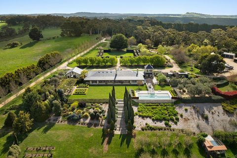 In Conjunction With Lisa Fowler ... , Mount Macedon Realty. Magnificently nestled within one of the most beautiful garden settings in the region and commanding uninterrupted views to the Macedon Ranges, this stunning designer residence provides a uni...