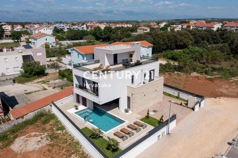 ZADAR - ZATON - LUXURY VILLA WITH POOL AND SEA VIEW REDUCED PRICE, OPPORTUNITY! For sale is a luxury villa with a pool in Zaton, a modern new build that offers top-notch design and equipment. The villa is perfectly arranged, with attention paid to ev...