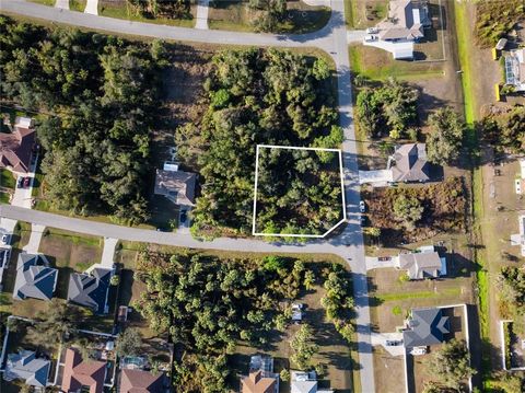 Coveted CORNER LOT in a great location! This parcel offers the best of both worlds! Build your dream home on this property and enjoy the serenity of nature and abounding wildlife, with the grocery store just a quick jaunt. Of course, world renowned b...