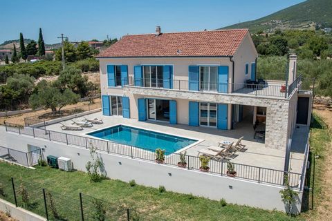 A luxury villa located in a quiet location in Kaštel Novi, surrounded by olive groves, vineyards and luxury villas, providing the perfect environment for enjoyment and relaxation. The location is extremely practical, as there are shops, kindergartens...