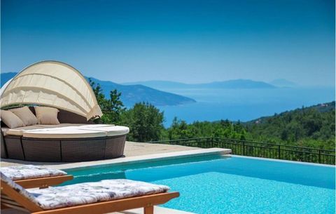 For sale: a stunning secluded villa with a garden of nearly 1,000m², featuring an infinity pool, summer kitchen, mini golf course, and children’s playground, all surrounded by lush greenery and offering breathtaking views of Kvarner Bay. We present a...