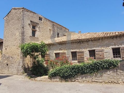 SAINT RESTITUT Incredible charming house in the village of Saint Restitut, a main house , a separate flat, a studio the lot for 250 m² of living space. In the main house a listed tower with a superb stone staircase. Salon with 'plafont à la Française...