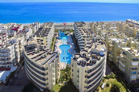 Alanya-Mahmutlar NAAST DE KUST VOLLEDIG LUXE GEMEUBILEERD - 1+1 50m2 - Amerikaanse keuken - Westgevel - 1 Balkon - 1 badkamer en toilet -Zwembad, 24/7 beveiliging, parkeerplaats, camelia, onderdoorgang naar de zee, generator NEEM CONTACT OP VOOR MEER...