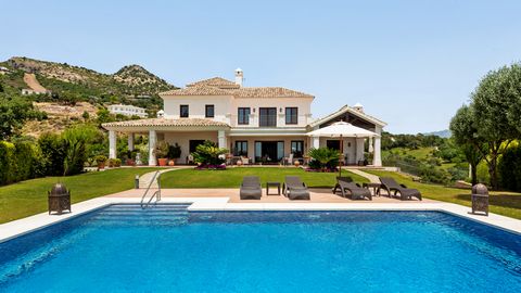 This stunning luxury villa is ideally located inside the highly exclusive Marbella Club Golf Resort in Benahavis, benefitting from an elevated position within the community that affords the home with spectacular sea, golf, and mountain views. Immacul...