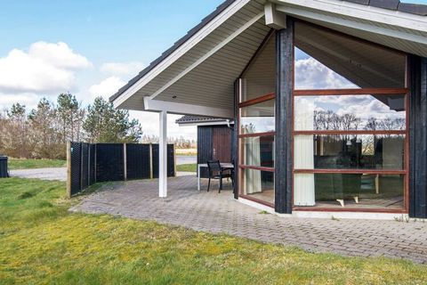 Holiday home with whirlpool and sauna located in quiet and scenic surroundings by Kvie Lake. The house is comfortably and tastefully decorated with plenty of space and is bright and inviting. The kitchen is furnished with all modern aids and in the l...