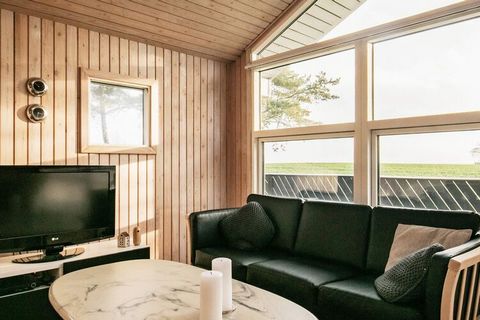 Holiday cottage overlooking the sea and the beautiful natural landscape that characterises Sydlangeland. The large windows give an incredible light. Four bedrooms and alcove, two bathrooms with whirlpool and sauna. From the large kitchen/dining area ...