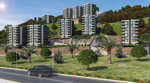Immobiliers avec 4 Types de Chambres à Yomra Trabzon Les immobiliers sont situés dans le district de Yomra à Trabzon. Les immobiliers avec vue sur la mer sont à distance de marche des commodités telles que les institutions gouvernementales, les banqu...
