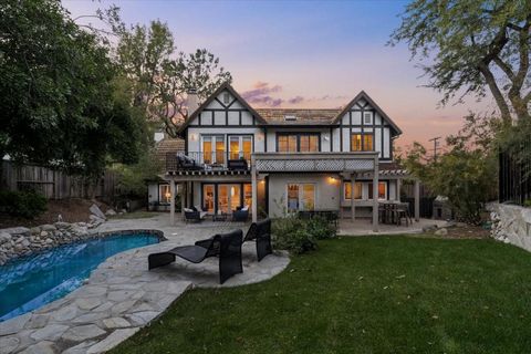 Welcome home to this Tudor Estate in the most desirable enclave in Tarzana. Situated on a quiet, tree-lined, low-traffic street South of Ventura, this idyllic location provides the best of all worlds - just minutes to the shops and restaurants of Ven...