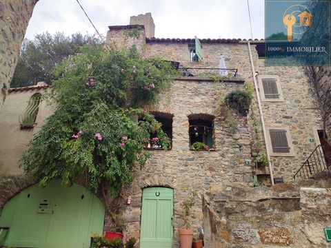 UNDER OFFER! 1000 % IMMOBILIER offers you in EXCLUSIVITY in ROQUEBRUN ' nicknamed the little Nice ' this superb 12th century village house erected in a dominant position overlooking the Orb valley, at the entrance to the Haut Languedoc Regional Natur...