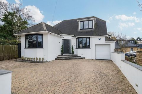 A luxurious, flexible and modern 4-bedroom detached house, boasting 5 receptions, a kitchen/diner, dressing room and en suite to master bedroom, located at the end of a quiet cul de sac in Cuffley. Upon entering, there is a large hallway with tall ce...