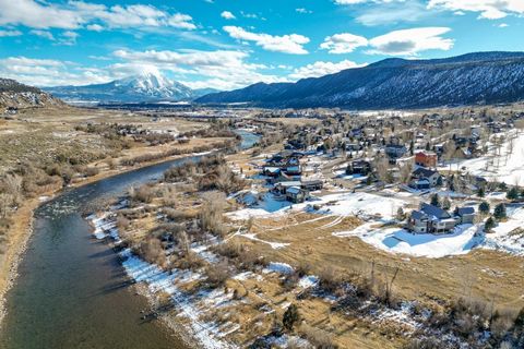 Trifecta - RIVER, VIEWS, and GOLF - Experience the perfect balance of nature and modern living in this 3-bedroom, 3.5-bathroom home in Ironbridge. Nestled alongside the Roaring Fork River with breathtaking views of Mt. Sopris, this property offers a ...