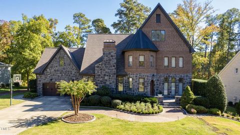 This stately manor is fit for royalty. The refined architecture gives way to modern conveniences inside to provide the best of both worlds. Golf course views overlooking the 14th tee box in the Preserve at Jordan Lake. Classically modern, and comfort...