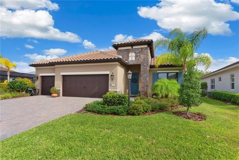 Welcome to the stunning 3 bed, 2.5 bath home of your dreams! Nestled in the gated INDIGO community of Lakewood Ranch, this property is a rare gem that offers luxury living in a maintenance-free environment. The first impression will undoubtedly be th...