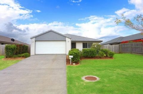 This spacious open-plan home offers a living and dining area that seamlessly connects to a low-maintenance great outdoor space with a flat yard. The modern kitchen has plenty of storage and with four well-appointed bedrooms and two spacious living ar...