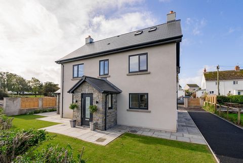 Ty Gwyr sits in a prime location in the South Gower hamlet of Scurlage just moments away from an array of sandy beaches, you will be spoilt for choice. This newly built 5-bedroom detached home offers substantial living spaces. It is immaculately pres...