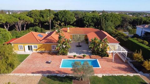 Located in Quinta do Lago. Nestled within the luxury resort of Quinta do Lago, you will find this charming villa on a spacious plot with adopted land. The property is built in a 