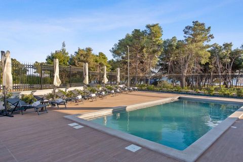A luxurious new built villa in Vodice near Šibenik, located on the 1st line to the sea ,  a few meters from the beach, which is also an 8 km long promenade connecting Vodice and the picturesque fishing village of Tribunj! It is a beautiful green calm...