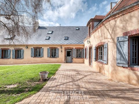 Located 5 minutes from Maintenon and all its shops, 20 minutes from Chartres and 1h30 by car from the gates of Paris, this large renovated old house develops approximately 330m2 of living space on a plot of 2910m2. As you pass through the wooden entr...