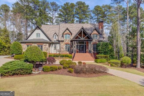 Traditional River Club meets modern luxury in this incredible remodel on the 4th fairway! Over $400, 000 in material recent renovations including complete basement bar remodel with copper clad walls and 5 television display media room. Updated modern...