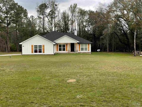 Four acres of quiet country living with all the comforts of a modern farmhouse! This custom built 3BR/2BA home does not disappoint! Built in 2021, it's practically brand new. Step inside this 1,877sf home and you will instantly see that custom featur...