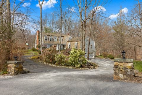 Stunning picture-perfect waterfront colonial in sought-after Twin Ridge neighborhood is tucked away on a private drive off cul-de-sac on over 2 acres of land. This expansive light-filled 4 Bed, 3.5 Bath home has a perfect balance of timeless architec...