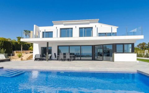 Luxury villa with sea views in Moraira, Costa Blanca The house is located in an exclusive area called El Bosque in Moraira. The house has a 1200m2 plot and a 350m2 house, 5 bedrooms and 5 bathrooms, open kitchen, living-dining room, terrace, garden a...