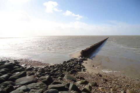 Experimente las puestas de sol sobre el mar de Wadden en el jardín de invierno. Adecuado para el apartamento Meerblick60