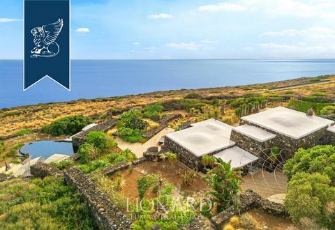 This luxurious dammuso villa on Pantelleria's southern coast, known as the Black Pearl of the Mediterranean, offers 200 sqm of elegant living space surrounded by a 1,000 sqm Mediterranean garden. The property features a panoramic terrace, an inf...