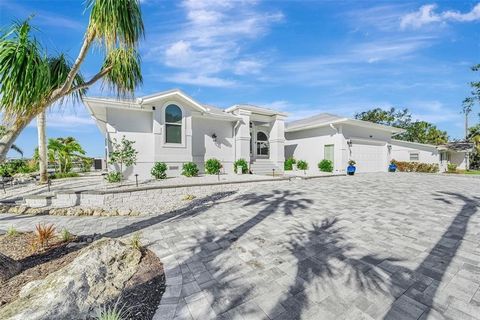 Beautiful, updated home on Blackburn Bay in Nokomis with sunset views overlooking Casey Key. This 3-bedroom 2.5 bath 2388 sq ft. home has been extensively updated with new finishes and improvements throughout. The home is located on a quiet privately...