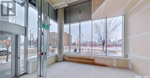 Located steps from the vibrant River Landing district, this fully concrete commercial space offers an ideal opportunity for any business looking to establish itself in one of the city's most desirable up and coming areas. With 18-foot ceilings and la...