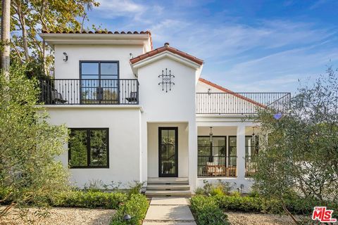 Nestled in the prestigious Santa Monica Canyon, this newly remodeled and gated Contemporary Spanish home radiates warmth, charm, and sophistication. Upon entering, you are greeted by a formal entry that seamlessly leads to elegant living, family, and...