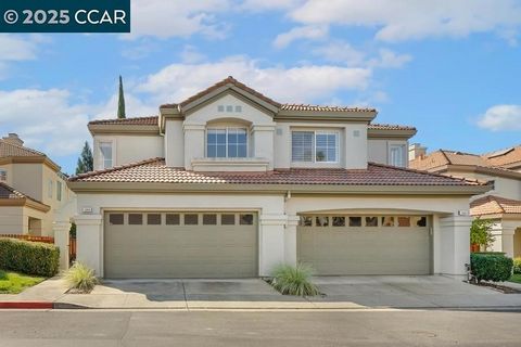 Nestled within a gated community, this 3-bedroom, 2.5-bath duet home offers 1,732 sq. ft. of thoughtfully designed living space. The open, light-filled floor plan showcases stunning golf course views, creating a seamless connection between indoor com...