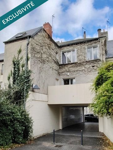 Immeuble avec deux appartements cœur de centre ville.