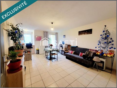 Appartement T2 de 40m² avec une terrasse et place parking dans une résidence sécurisée.