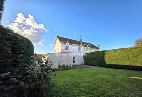 Ouistreham – Le Bourg : Maison familiale avec potentiel, terrain et grand garage