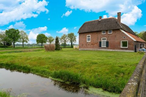Enjoy plenty of peace and nature from this comfortable and historic holiday home in the province of Gelderland. It features a fine location in a wooded area and comfortably accommodates several families. This holiday home concerns the front house, wh...