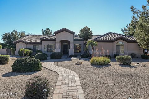 Investment Opportunity! This property is rented through April 2026. Welcome to your Litchfield Park 5 bed, 4 bath home! This custom property sits on an expansive lot and features approximately 3,465 of living space including a detached GUEST HOUSE wi...