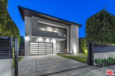 Welcome to 455 N. Kilkea Drive, a custom modern masterpiece nestled in the heart of the highly sought-after Beverly Grove neighborhood. This remarkable architectural achievement epitomizes modern luxury, promising a lifestyle defined by unmatched ref...