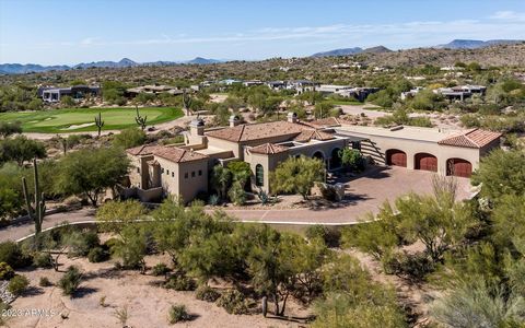 Golf membership Available! As you turn onto the meandering driveway, your curiosity will be piqued. The architect designed this custom home to look as if it were a Mediterranean Villa on a Knoll. As soon as you enter through the front door, you will ...