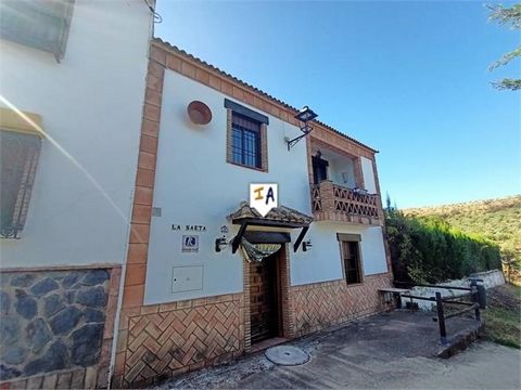 This beautifully presented furnished property is in a small village 10 km from Rute, in the province of Cordoba in Andalucia, Spain. The Cortijo consists of an entrance porch that leads inside to an open plan living and dining room with a feature fir...