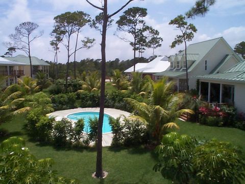 This two storey home is within 1 minute walking distance to a beautiful beach. You and your family can lounge by the pool, just outside your back door or join the rest of the community at the large infinity pool and hot tub. The home boasts marble ti...