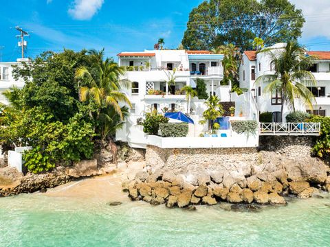 Located in Prospect. Ocean Blues is a beautiful multi-level home with pool located on Batts Rock, St James. The sea views are stunning from each level and this private home has an enclosed stairway that leads down to a private beach cove or the sea d...