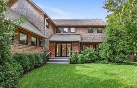 Located in Bridgehampton, and just 2.5+- miles to the Village of Sag Harbor, this open, airy retreat features 5 bedrooms with 5 full and 2 half baths across 5,000+- sf. The sophisticated modern farmhouse has been expertly crafted and is sited on an i...