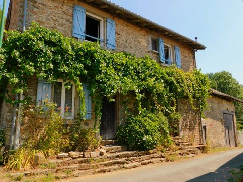 This beautiful old house is situated in a quaint hilltop hamlet just a short walk from a viewpoint with panoramic views over the Monts de Chalus. The property can be accessed from the road via an entrance hall. On this upper level, there are four roo...